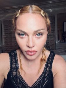 Madonna Hospitalized: Postpones her tour after an intensive care unit stay.